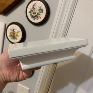 Small white wall shelf